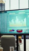 Vertical Empty boardroom setup with a computer displaying financial data, facilitates effective communication and strategy development for a successful business project. Performance goals. video