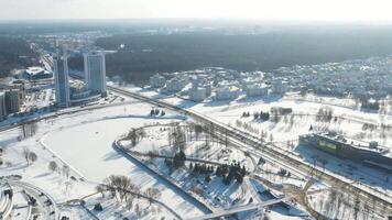 View from the height of the new microdistrict in the city of Minsk in winter.The new lighthouse district and the private sector.Belarus video