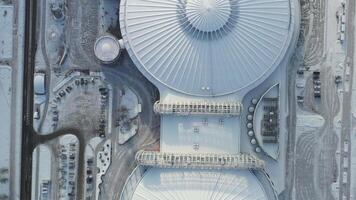Top view in winter of a modern sports complex with parking in Minsk. Belarus video