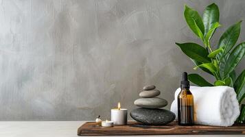 Spa products on a wooden tray with a stone plant photo