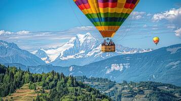 A hot air balloon flying over a mountain range photo