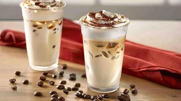 Two glasses of coffee with whipped cream and chocolate chips photo