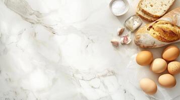 Bread, eggs and bread on a marble counter photo
