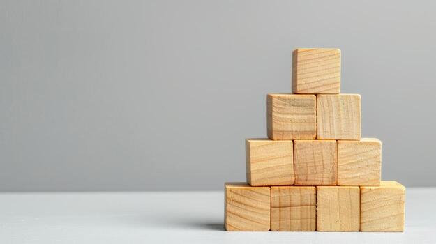 A stack of wooden blocks on a table photo