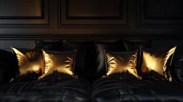 A black leather couch with gold pillows photo