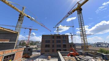 A construction site with several cranes and buildings photo
