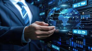 Businessman holding a globe on a digital background photo