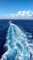 A large cargo ship traveling through the ocean photo