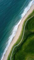 Aerial view of a golf course and ocean photo