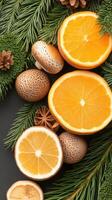 Christmas background with oranges, pine cones and fir branches photo