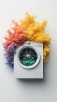 A washing machine with colorful powder coming out of it photo