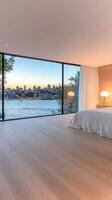 A bedroom with a view of the water photo