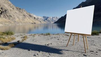 An easel with a blank canvas in front of a lake photo