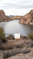 A white easel on a rocky hillside photo