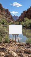 A blank easel with a river in the background photo