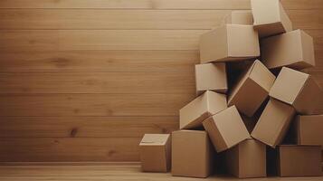 A pile of cardboard boxes in front of a wooden wall photo