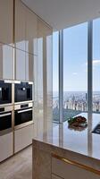 A kitchen with a view of the city photo