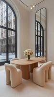 A dining room with a large mirror and chairs photo