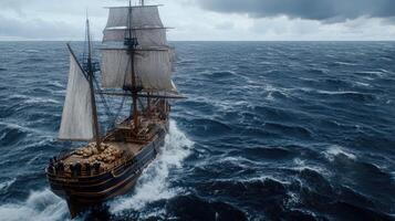 A large sailing ship in the ocean photo