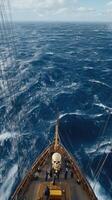 The bow of a sailing ship in the ocean photo