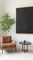 A chair and a table in a room with a blackboard photo