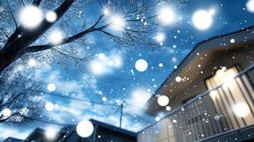 A house with snow falling on it and a tree photo