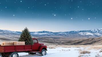 A red truck with a christmas tree in the back photo