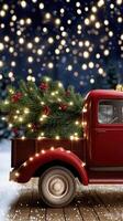 A red truck with a christmas tree in the back photo