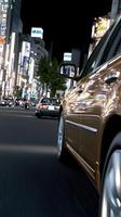 A car driving down the street photo