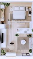 A small apartment with a bed, desk and a living room photo