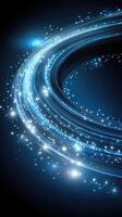 Abstract blue light and sparkles on a black background photo