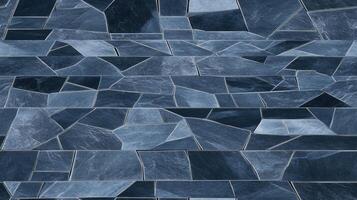 A blue and black pattern of stone tiles photo