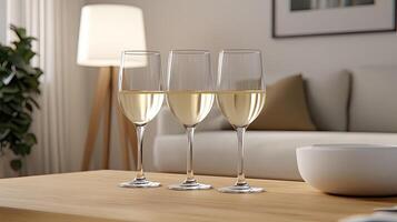 Three wine glasses on a table photo