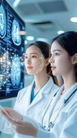 Two doctors looking at a screen with a brain image photo