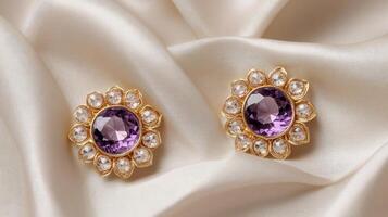A pair of purple and white diamond stud earrings photo