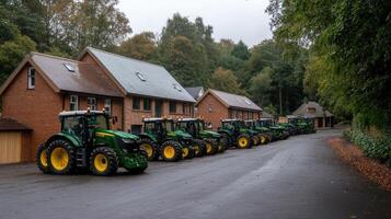 A row of tractors parked in front of a house photo