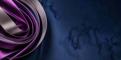 A purple and silver fabric with a spiral design photo