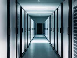 A long hallway with rows of servers in a data center photo