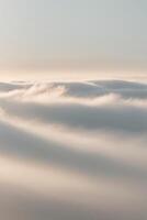 A serene landscape featuring soft clouds and gentle lighting in pastel shades of color. photo