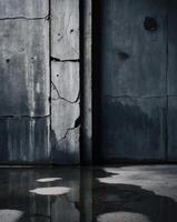 Dark concrete wall and wet floor create grungy background texture photo