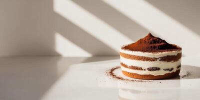 A small dessert with chocolate and cream on a white surface photo