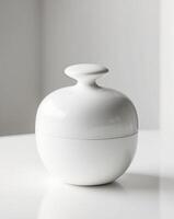 a white circular object with a round top photo