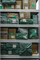 Shelves Filled With Packed Media Stock in a Spacious Warehouse Ready for Distribution photo