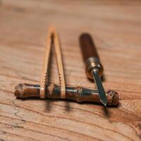Beautiful, handcrafted woodworking tools displayed elegantly on a rustic wooden surface photo