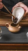 Artisan Tea Preparation Featuring an Exquisite and Unique Teapot Design for Brewing photo