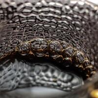 A CloseUp Image of Textured Glass Featuring Unique and Intricate Patterns and Design photo