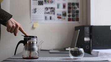 Creating a Coffee Brewing Setup within a Modern and Stylish Workspace for Enhanced Enjoyment photo