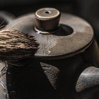 This intricate teapot features a unique pattern and texture, enhancing any decor photo