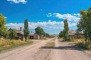 Deserted street in a ghost town on a sunny day. photo