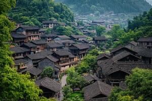 Aerial view of a traditional village nestled in a lush green valley. photo